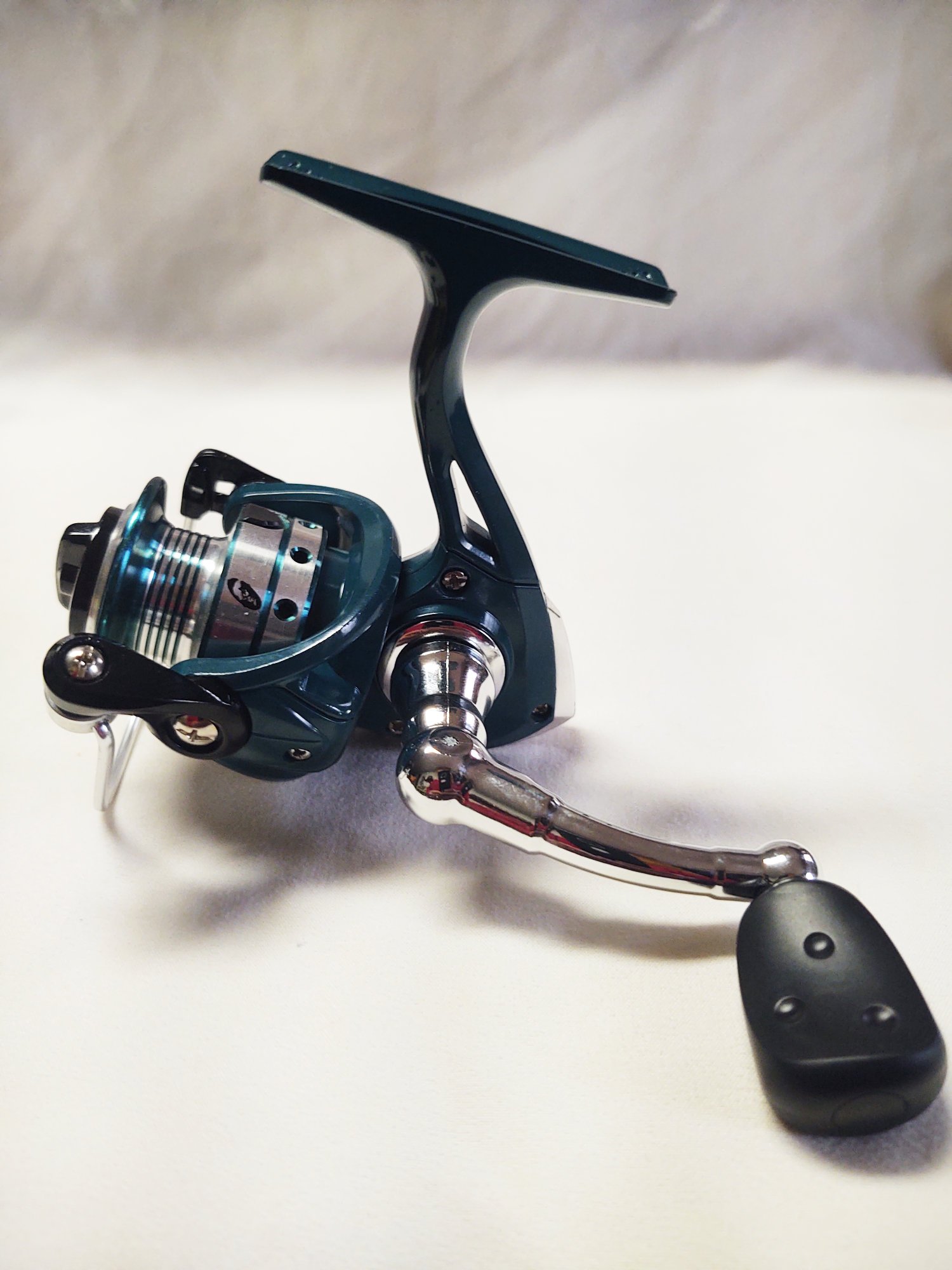 Teal Outlaw Spinning Reel - Outlaw Crappie Poles